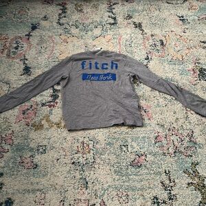 Long sleeve tee with blue and gray accents for kids size L